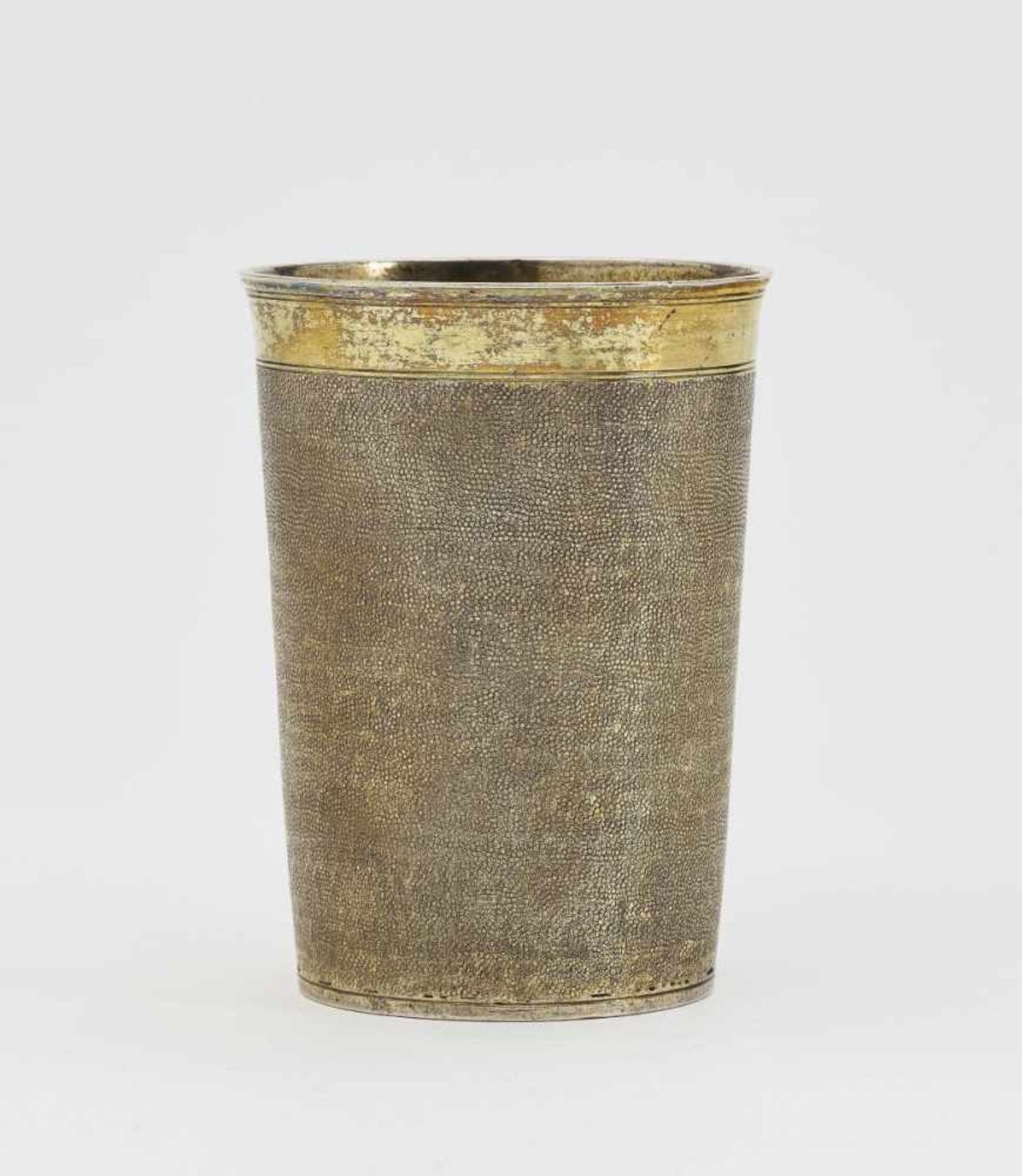 A Silver BeakerAugsburg, 1610 - 1612, Daniel Fischbacher Silver, gold-plated. Tapering cylindrical