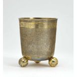 A Beaker with Ball FeetStrasbourg, late 17th Century Silver, gold-plated. Snakeskin pattern.