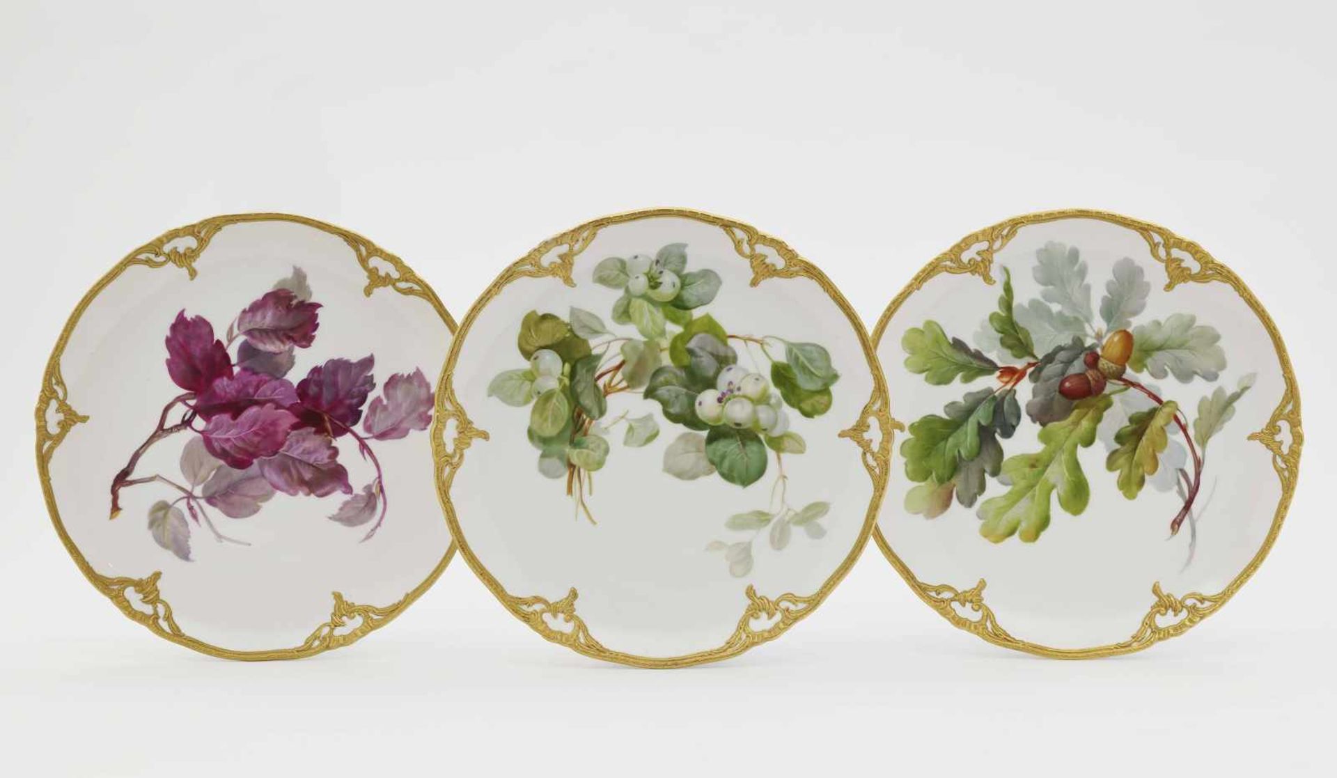 Ten dessert platesKPM Berlin Porcelain. Gilt rim with relief decoration. Each titled on the