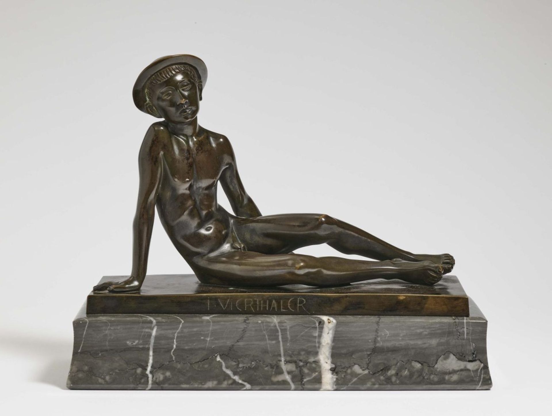 Young Man SittingJohann Vierthaler (1869 - Munich - 1957) Bronze, brown patinated. Marble base.