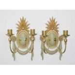 A pair of wall appliquesHans Wauer, furniture workshop, Munich, 1950s. Carved wood. Painted and