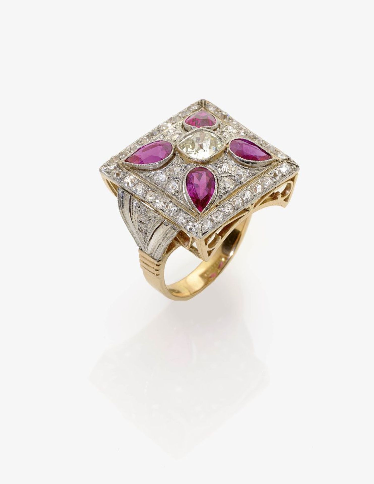 A Diamond and Ruby RingGermany, circa 1935 14K yellow gold and platinum, tested. 1 facetted,