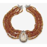 An Amber NecklaceAugsburg, GOTTFRIED SCHWARZ Silver partially gilded, tested. A large rock crystal