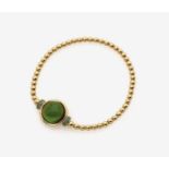 A Tourmaline set Bracelet18K yellow gold (750/-), stamped. 1 green tourmaline cabochon of circa 8.