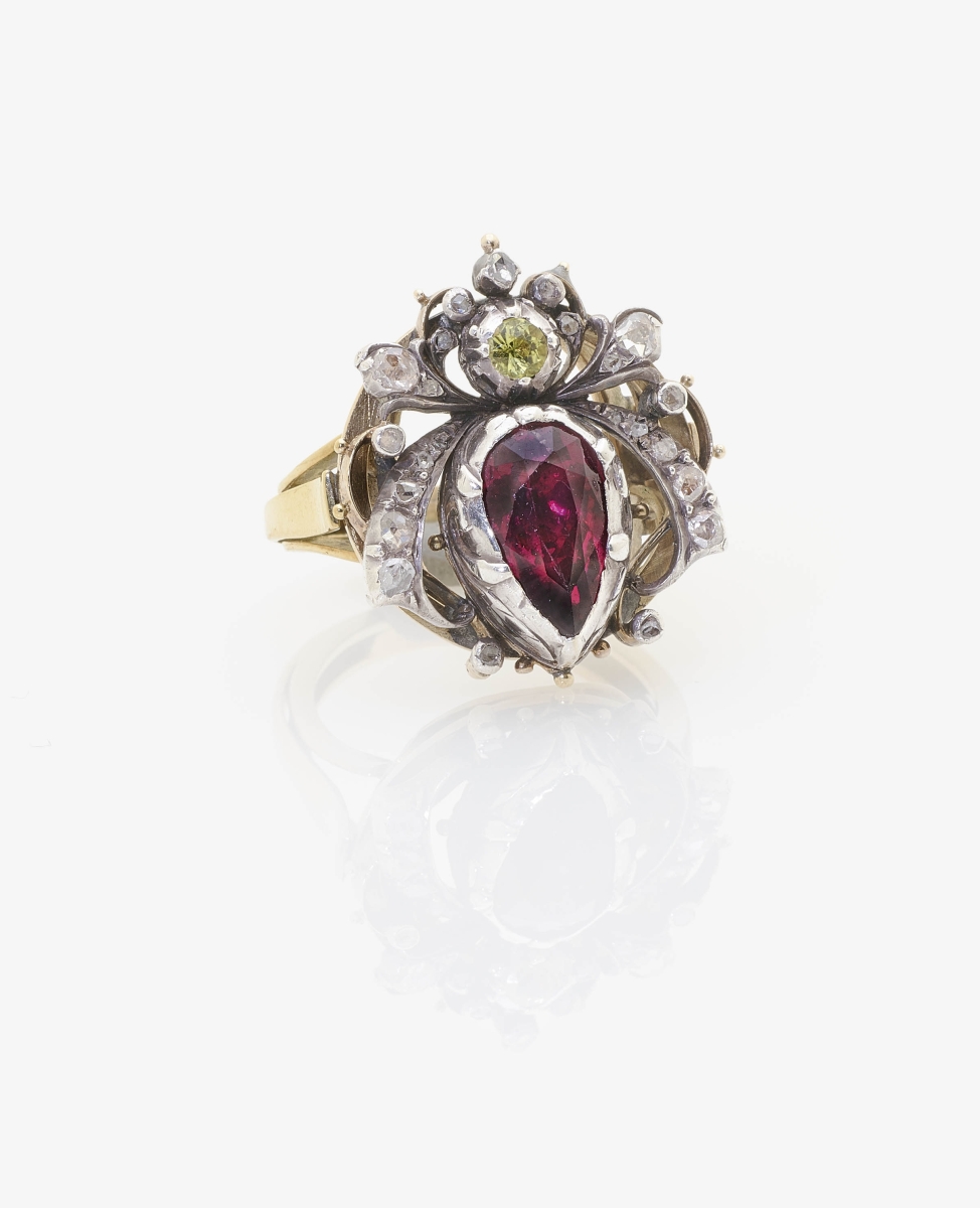 An Almandine and Diamond RingGermany, circa 1880 14K yellow gold and silver, tested. 21 rose-cut