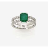 An Emerald and Diamond Ring18K white gold (750/-), stamped. Maker's mark W. 28 brilliant-cut