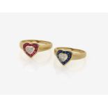 Two Rings set with Diamonds, Rubies and Sapphires18K yellow gold (750/-), stamped. 14 small,