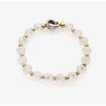 A Rock Crystal and Diamond Bracelet18K yellow and white gold (750/-), tested. 10 brilliant-cut