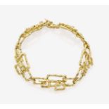 A Gold-Link BraceletParis, 1970s 18K yellow gold (750/-), tested. Length circa 21 cm. Circa 36.8 g.