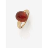 A Spessartine Ring18K rose gold (750/-), stamped. Maker's mark W. 1 oval spessartine cabochon of