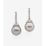 A Pair of South-Sea Cultured Pearl and Diamond Earrings18K white gold (750/-), stamped. Circa 92