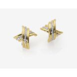 A Pair of Cross-Form Diamond Ear StudsGermany, 1990s-2000s 18K yellow and white gold (750/-),