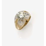 A Diamond Solitaire Ring14K yellow and white gold (585/-), stamped. 1 brilliant-cut diamond of circa