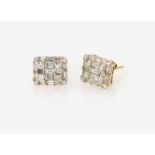 A Pair of Diamond Ear StudsGermany, 2000s 18K white gold (750/-), stamped. 16 small, brilliant-cut