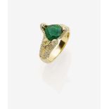 An Emerald and Diamond RingItaly 18K yellow gold (750/-), stamped. Hallmarks. 2 oval, facet-cut