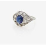 A Sapphire and Diamond RingGermany, circa 1915 Platinum, tested. 16 diamonds in various old-cuts,