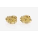 A Pair of Cufflinks with ''S'' EngravingUSA, 1920s-1930s 14K yellow gold (585/-), stamped. Top: