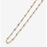 A Pearl and Gold Bead NecklaceGermany, circa 1900 8K rose gold (333/-), tested. Circa 102 cream