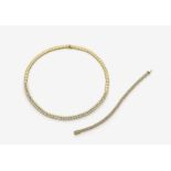 A Diamond set Necklace and Tennis Bracelet18K yellow gold (750/-), stamped. Circa 110 brilliant-