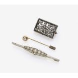 Two Brooches and A Tie Pin with DiamondsGermany, circa 1880 and 1930s 14K white gold (585/-) and 18K