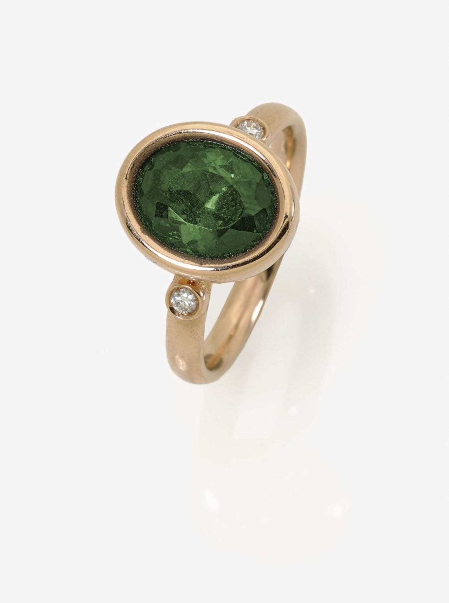 A Tourmaline and Diamond Ring18K yellow gold (750/-), stamped. Maker's mark W. 2 small brilliant-cut