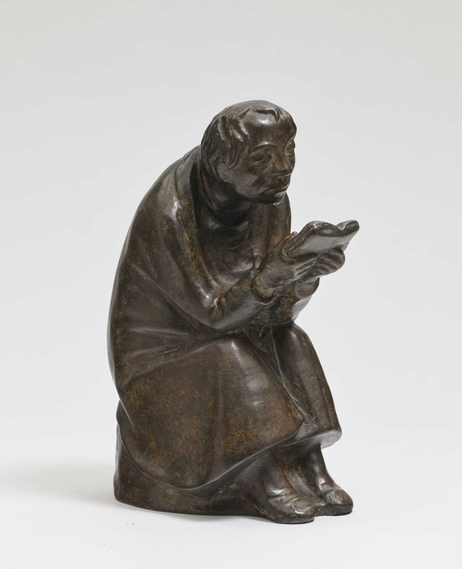 (After) Barlach, ErnstThe book reader (Reading man in the wind) Bronze, brown patinated