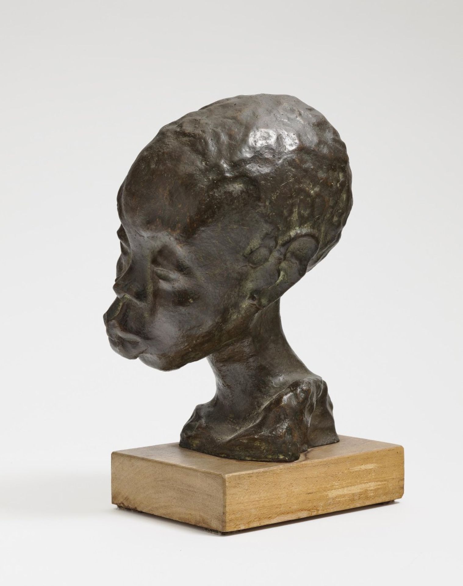 von Ruckteschell-Trueb, ClaryHead of a Black Boy. Bronze, patinated in dark brown, on wooden base