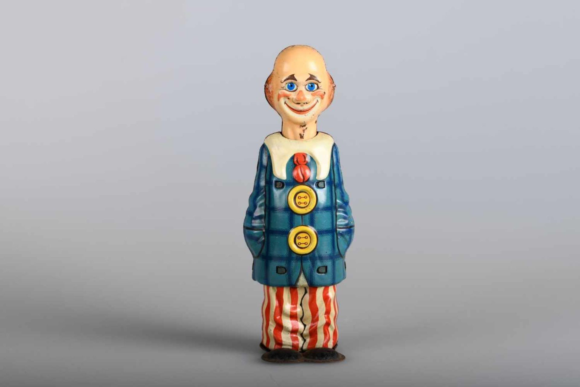 Distler Clown Happylithographiert, h ca. 15 cm h, Uhrwerk intakt