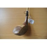 "Wood. Antique right handed. Length to heel: Cane