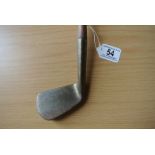 "Antique right handed deep faced Mashie. Length to