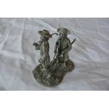 A pewter figure titled 'The Blackheath Golfer', pr