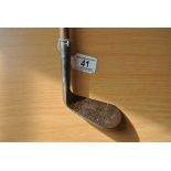 "Antique left handed Mashie. Length to heel: 90.5c