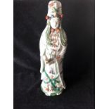 A large Japanese Satsuma pottery figure of Guan Yin, depicting the standing figure with ornate