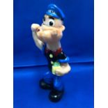 Vintage KFS soft plastic Popeye toy, modelled holding a foaming mug with one arm raised,