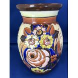 Boch Freres, Belgium -A Keramis vase, ovoid with flared neck, decorated with Art Deco flowers in