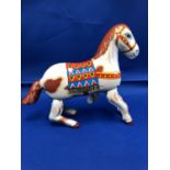 HAJI Japan, a clockwork 'tin' jumping horse toy, printed in polychrome colours, 22cm max