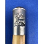 The Queens Royal Surrey Regiment - a nickel plated mounted swagger stick, the shaft of bamboo,