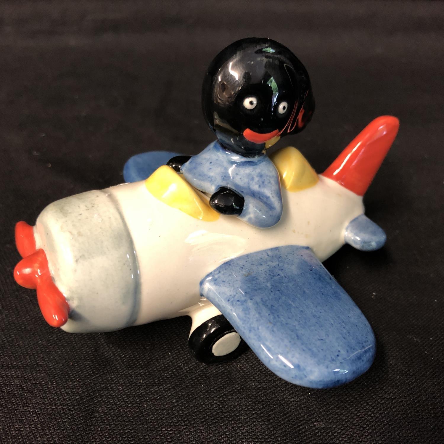 Carlton Ware - A limited edition small Golly in his aeroplane, numbered 17/25, gollys head and - Image 8 of 14