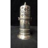 A Silver sugar caster, decorated in Gothic style with foliate 'strapwork' to cover over similar