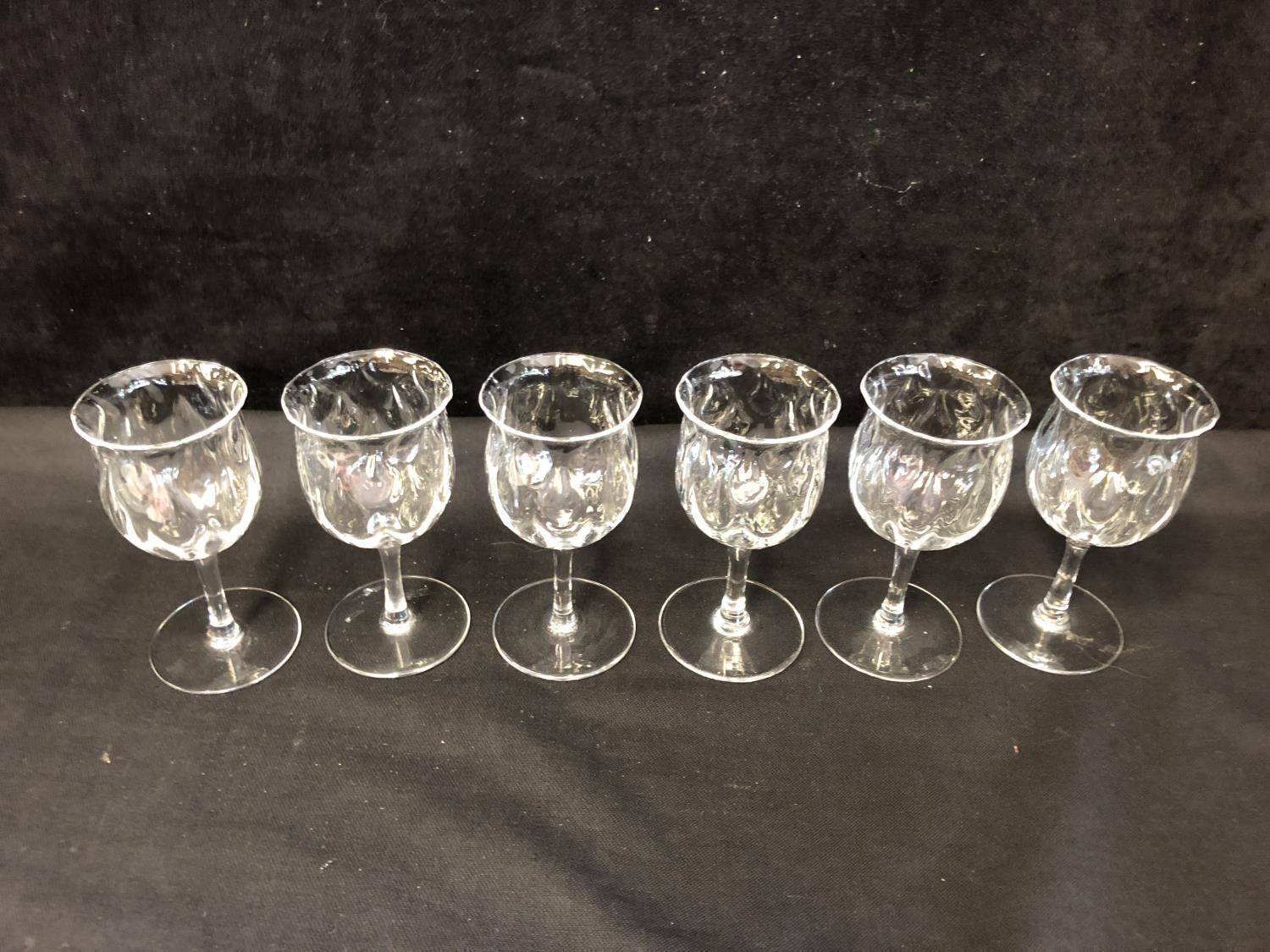 Six Webbs poppy head form glasses, with optical paisley design to the bowl, acid etched mark to - Image 2 of 4