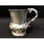 A Georgian silver small mug, the bell form body applied with serpent 's' scroll handle and on
