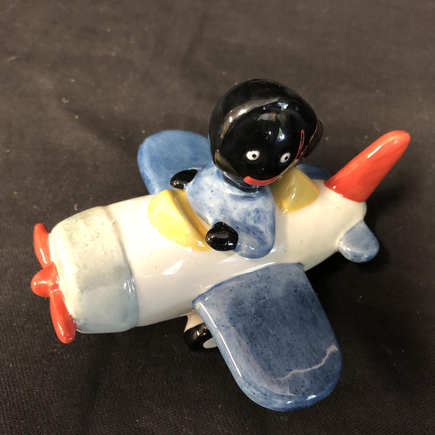 Carlton Ware - A limited edition small Golly in his aeroplane, numbered 17/25, gollys head and - Image 10 of 14