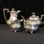 A four piece silver Georgian style tea and coffee service, each piece with finely gadrooned edge and