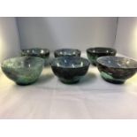 Daum, Nancy - Six Verre de Jade glass bowls, the cased glass of purple, blue and white powder and