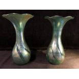 Isle of Wight- A pair of convolvulus bud form glass vases of nacreous green blue colour, 21.5cm