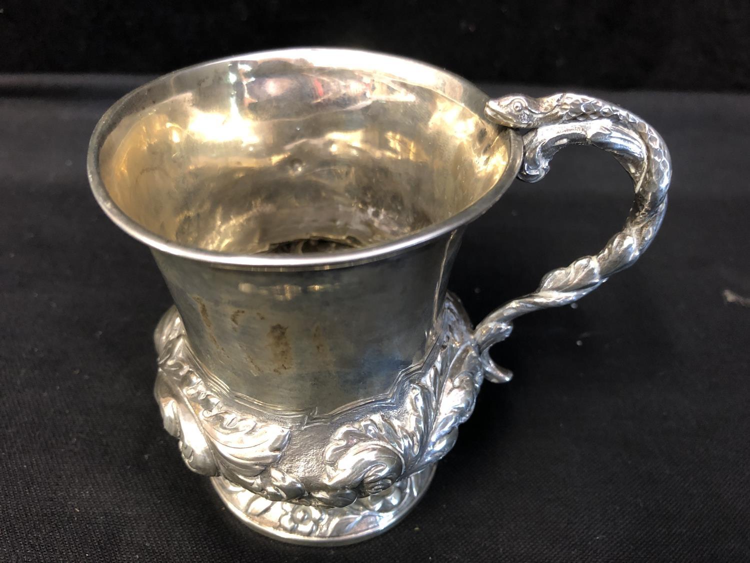 A Georgian silver small mug, the bell form body applied with serpent 's' scroll handle and on - Image 2 of 7