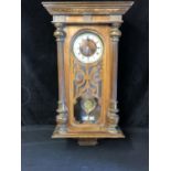 A Vienna Regulator wall clock, probably Gustav Becker, mahogany cased with fretwork glazed door,