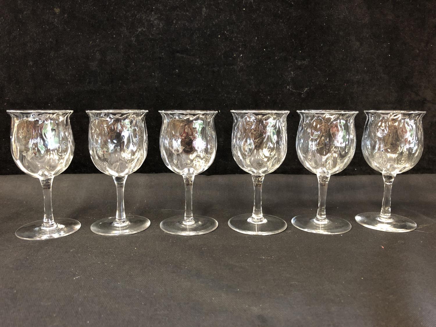 Six Webbs poppy head form glasses, with optical paisley design to the bowl, acid etched mark to