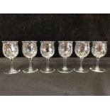 Six Webbs poppy head form glasses, with optical paisley design to the bowl, acid etched mark to