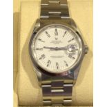 A Rolex Oyster Perpetual DATE wristwatch, model no 15210, 34mm white dial marked Superlative